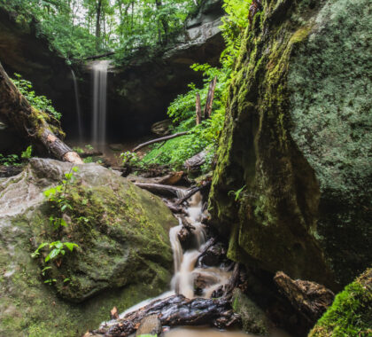 a father and son enjoy hiking at salt fork