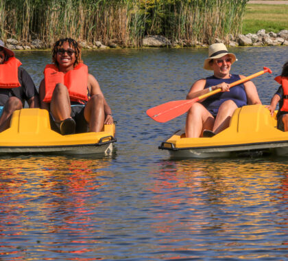 two couples enjoy the paddle boats on maumee bay