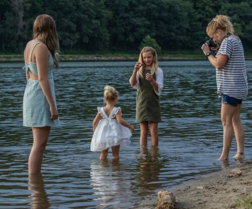 Kids playing in the lake